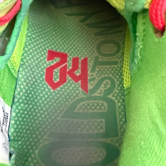 Nike Vibrant Green Athletic Shoes with Red and Yellow Highlights